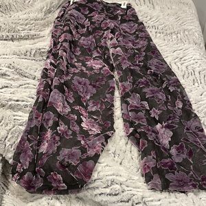 Purple pants embellished with beautiful flowers